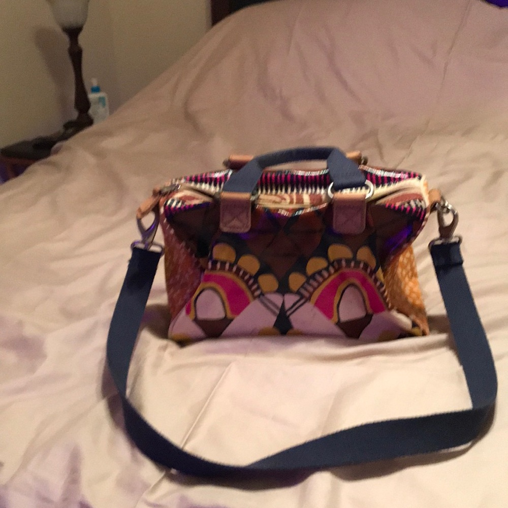 Fossil fabric and vinyl bag. Some pen markings.